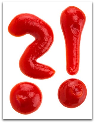 To represent I don't know there is a question mark and an exlaimation mark written in what looks like a red tomato type sauce on a white background.