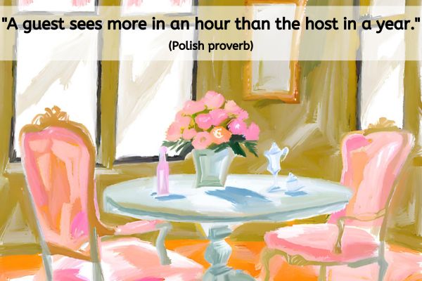 The image for the "Gaining Clarity: Exploring A Coaching Perspective Through a Fresh Lens" post is in an oil painting style.
Two ornate chairs with arms are sat either side of a round table. On the table sits a pot with rose type flowers arranged in ths same pink tones that are depicted in the chairs. There are windows visible on the wall and a mirror in a frame.
The text reads: "A guest sees more in an hour than the host in a year." (Polish proverb)