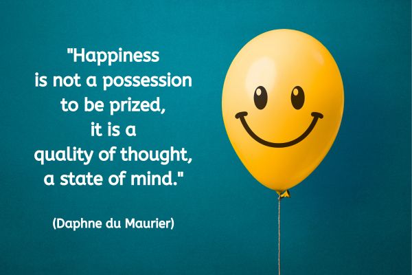 The background is a bright teal/green shade. To the right is a yellow balloon floating in the air with a string fastened to it and dangling down and out of sight at the bottom of the image. The yellow balloon has two eyes drawn on in black and a big smiling face.
The text to the left reads: "Happiness is not a possession to be prized, it is a quality of thought, a state of mind." (Daphne du Maurier)"