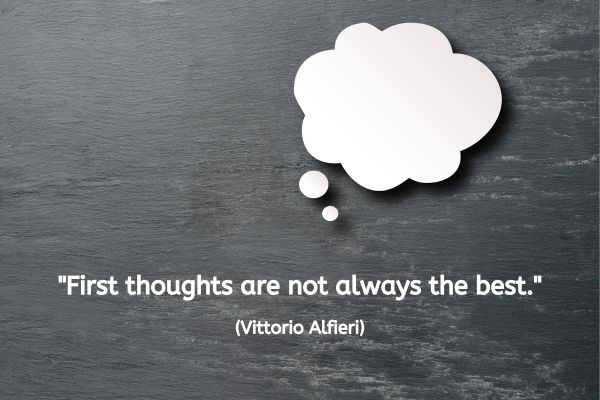 A dark grey/ black background with a wood grain effect. A white, empty thought bubble takes up the top right quarter of this image. The text reads: "First thoughts are not always the best." (Vittorio Alfieri)