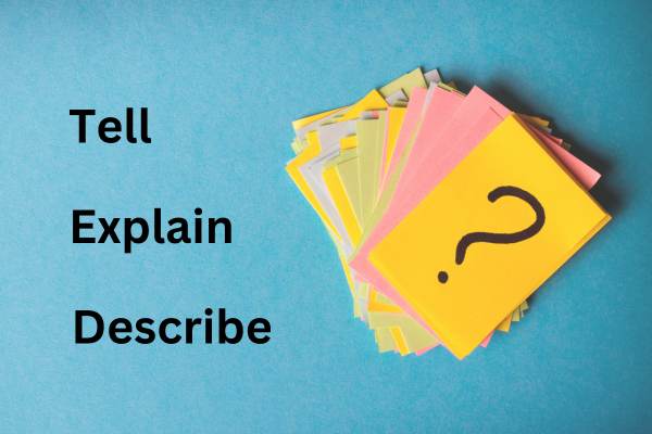A teal background has a pile of different coloured piles of PostiIt notes books. The yellow top one has a question mark drawn on it. Three words are written to the left in the form of a list: Tell, Explain and Describe. The first letter of each word is capitalised, demonstrating what TED questions is an abreviation for.
