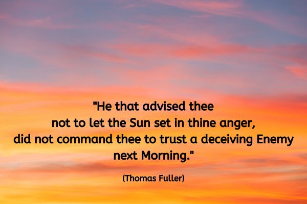 The image shows a vibrant sunset or sunrise sky, transitioning from soft blue and purple hues at the top to warm orange and yellow tones near the horizon. The quote is centred in black text and reads: "He that advised thee not to let the Sun set in thine anger, did not command thee to trust a deceiving Enemy next Morning." The quote is attributed to Thomas Fuller.