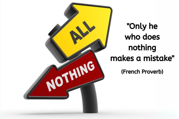 The image features two directional signs positioned at an angle, illustrating contrasting ideas. The sign pointing to the left is red and labelled “NOTHING” in bold white letters, while the sign pointing to the right is yellow and labelled “ALL” in bold black letters. Beneath the signs, there is a quote in large, clear font that reads: "Only he who does nothing makes a mistake" This quote is attributed to a French proverb. The background is simple and white, allowing the signs and text to stand out prominently.