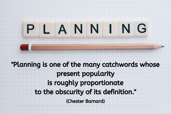 The image features a clean, grid-patterned white background. Across the top of the image, the word "PLANNING" is spelled out in black letters using Scrabble-style tiles. Below the tiles, a wooden pencil with a red eraser is placed horizontally, aligning neatly with the text above. Beneath the image elements, the quote "Planning is one of the many catchwords whose present popularity is roughly proportionate to the obscurity of its definition." (Chester Barnard) is written in bold, black text, standing out clearly against the white background. The overall layout is simple, minimalistic, and focused.